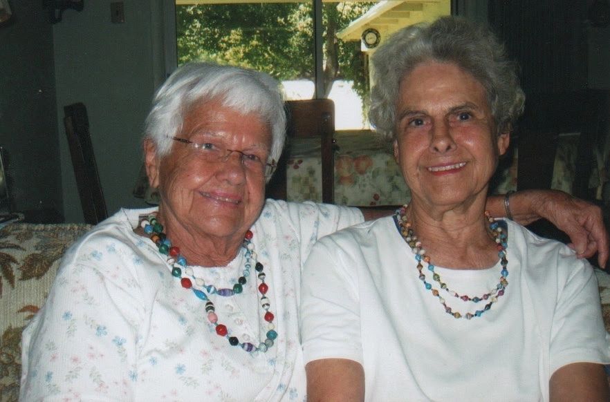 Auntie Lois and my mama wearing necklaces from Kenya   